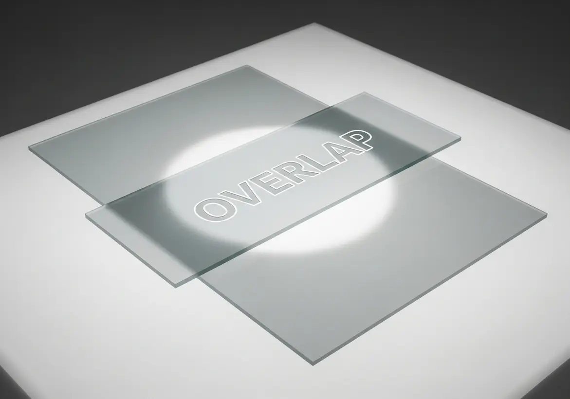 Two overlapping translucent glass plates illuminated by a spotlight with OVERLAP engraved across the intersection symbolizing unified security controls.