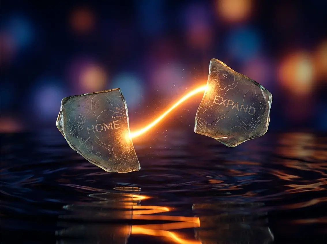 Two glowing glass fragments labeled HOME and EXPAND connected by a beam of light over dark water, symbolizing interprovincial business expansion.